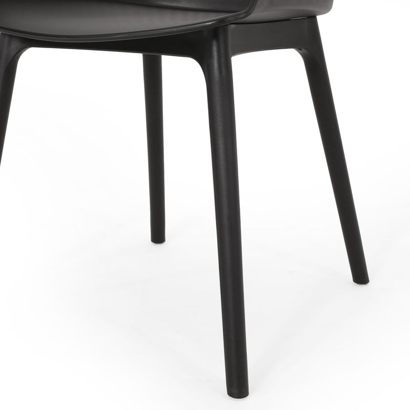 Set of two Noble House Dahlia chairs with sleek wooden legs and cushioned seats, ideal for dining or living room decor.