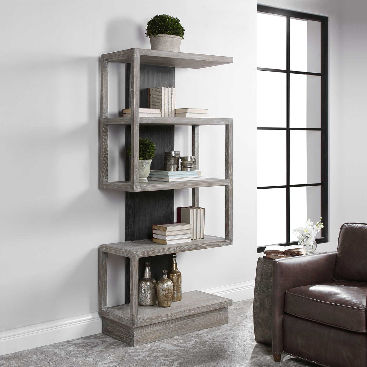 Modern pearl silver etagere by Uttermost with sleek metal shelves and a minimalist design for stylish storage.