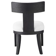Uttermost Idris armless side chair with a modern design, featuring a sleek frame and comfortable upholstered seat.