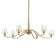 Uttermost Barcelona 6-light brass chandelier with gold finish, featuring elegant curved design and six light fixtures.