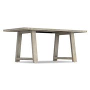 Wooden Whitley dining table by Simpli-Home with a smooth surface and sturdy legs, perfect for modern dining rooms.