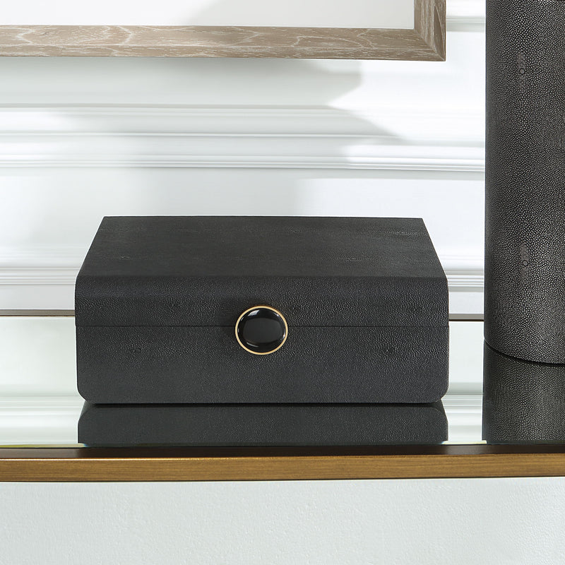 Lalique Art Deco box by Uttermost, featuring intricate glass design and elegant shape, used as a decorative storage or display piece.