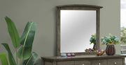Elegant wall mirror by Glory Furniture with a sleek, modern frame, perfect for stylish interior decor.