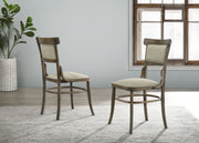 Set of two vintage walnut Lilola Home Bistro wide dining chairs with cushions, showcasing classic wooden design and comfortable seating.