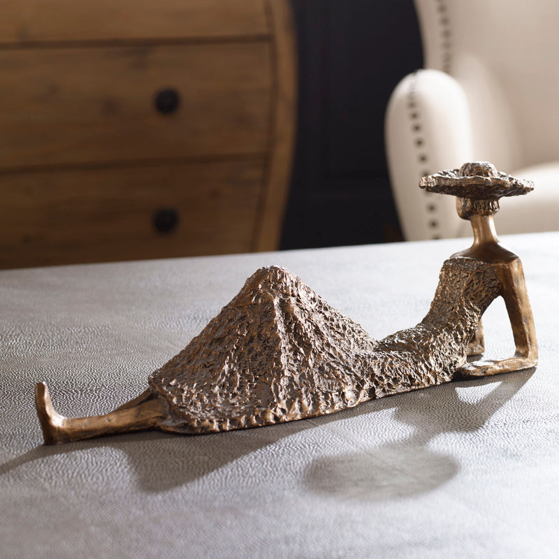 Antique bronze sculpture titled Summer Days by Uttermost, featuring a detailed figurine design in a decorative art style.