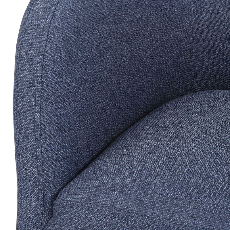 Uttermost Jacobsen accent chair with plush upholstery and wooden legs, featuring a modern design in a stylish living room setting.