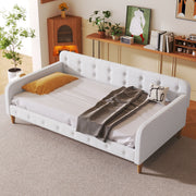 Modern upholstered daybed by Dreamland featuring a sleek design, plush cushions, and a contemporary frame perfect for living rooms.