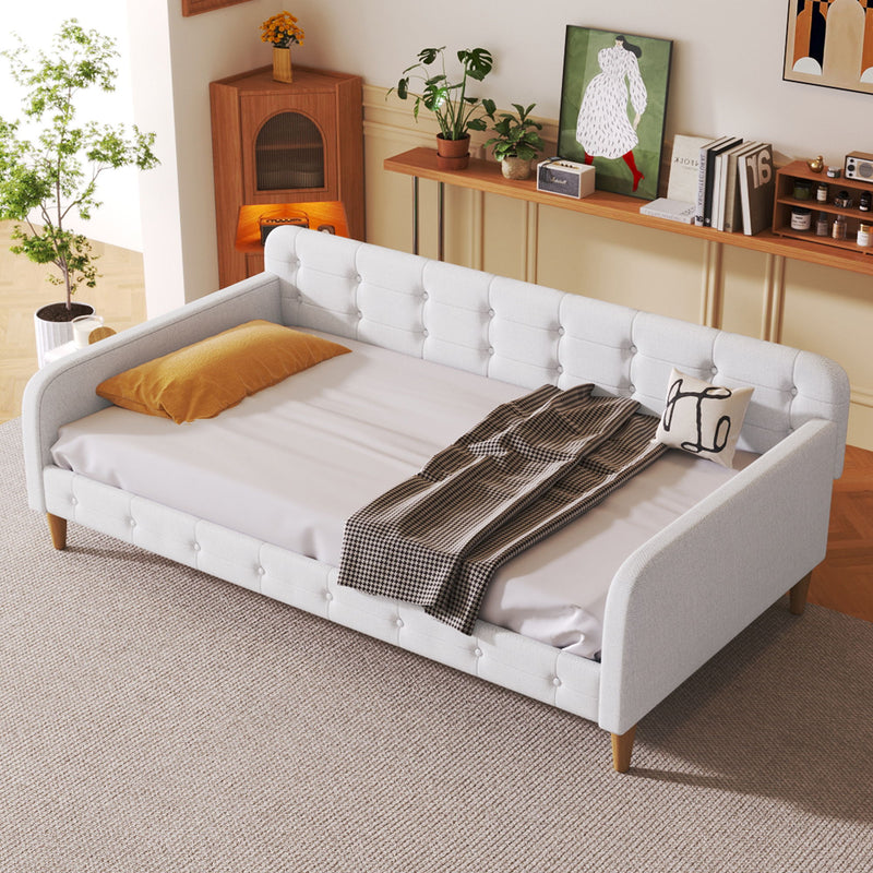 Modern upholstered daybed by Dreamland featuring a sleek design, plush cushions, and a contemporary frame perfect for living rooms.