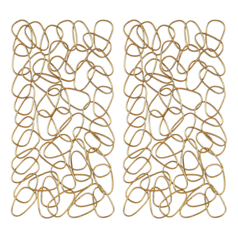 Set of two gold wall art decor pieces by Uttermost, featuring modern circular design for stylish home wall decoration.