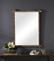 Uttermost Abanu ribbed dressing vanity mirror with a sleek, modern design and reflective surface for full-body viewing.