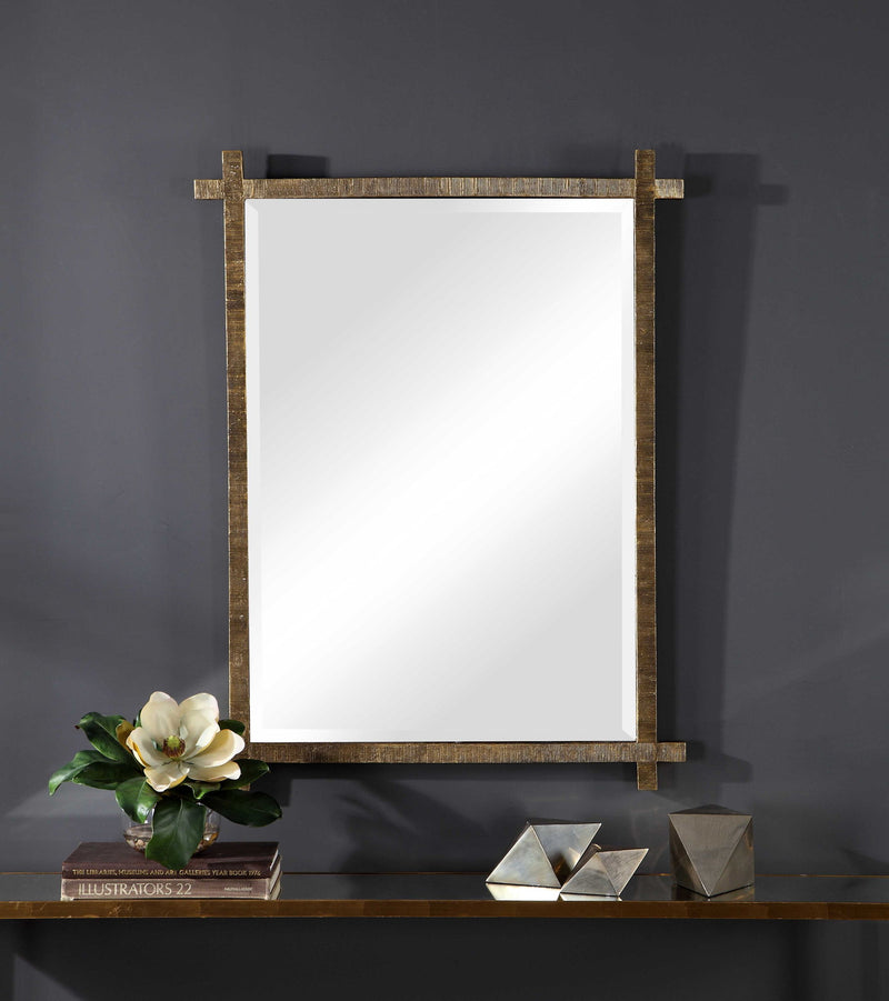 Uttermost Abanu ribbed dressing vanity mirror with a sleek, modern design and reflective surface for full-body viewing.