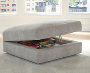 Benchcraft® Aslan Court 5-piece sectional living room set with matching ottoman, featuring plush upholstery and modern design.