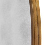 Uttermost Junius round wall mirror with a sleek frame, showcasing a modern decorative mirror for stylish wall decor.