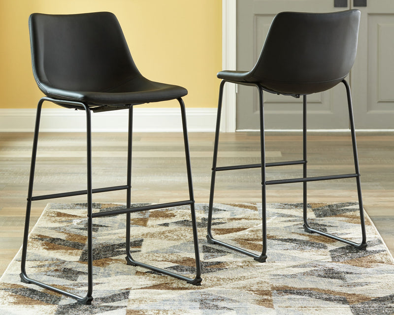 Set of two Signature Design by Ashley® Centiar upholstered barstools with cushioned seats and wooden legs.