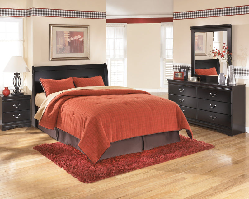 Black Huey Vineyard Queen Sleigh Headboard by Signature Design for Ashley, showcasing elegant curved design and smooth finish.