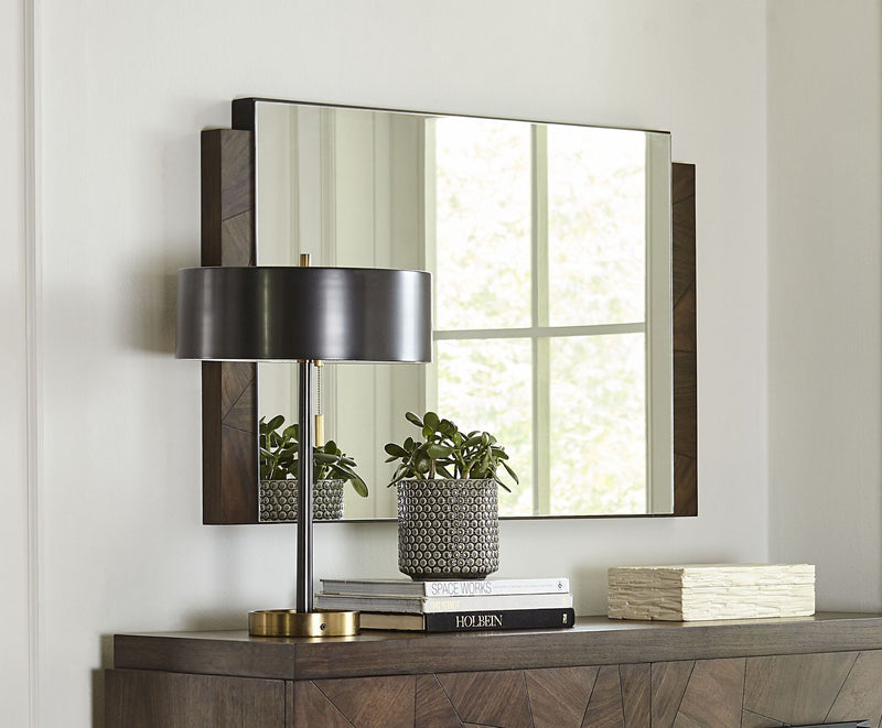 Modus Broderick Chesser mirror in Wild Oats Brown with a sleek frame, standing upright on a wooden surface.