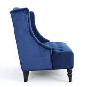 Noble House upholstered loveseat with wing back design and diamond tufting, showcasing plush fabric and elegant craftsmanship.