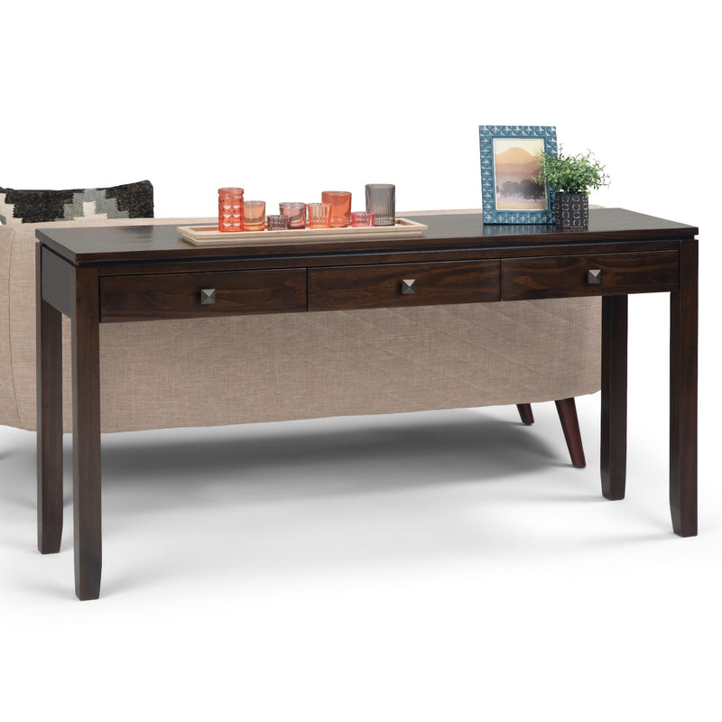Simpli-Home Cosmopolitan wide console sofa table in mahogany brown with sleek design and spacious surface for living room decor.