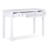 Handcrafted Warm Shaker writing desk by Simpli-Home with smooth wood finish and spacious surface for home office use.