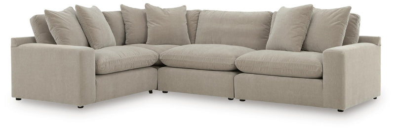 Benchcraft Maxton Heights stationary sectional sofa with plush cushions and modern design, perfect for contemporary living rooms.