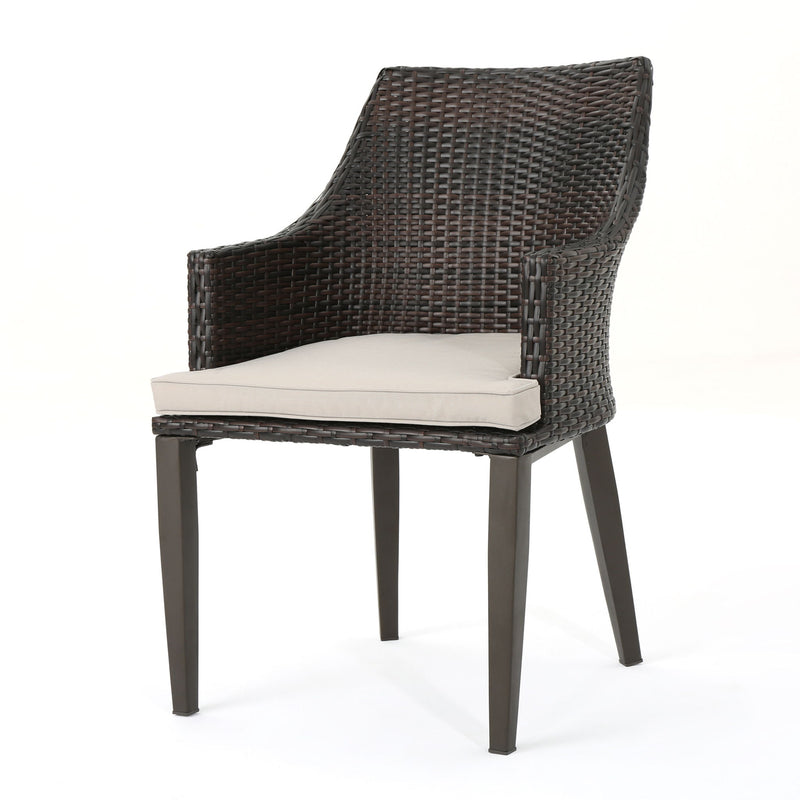 Pair of Noble House Hillhurst outdoor chairs with weather-resistant cushions, ideal for patio or garden seating.
