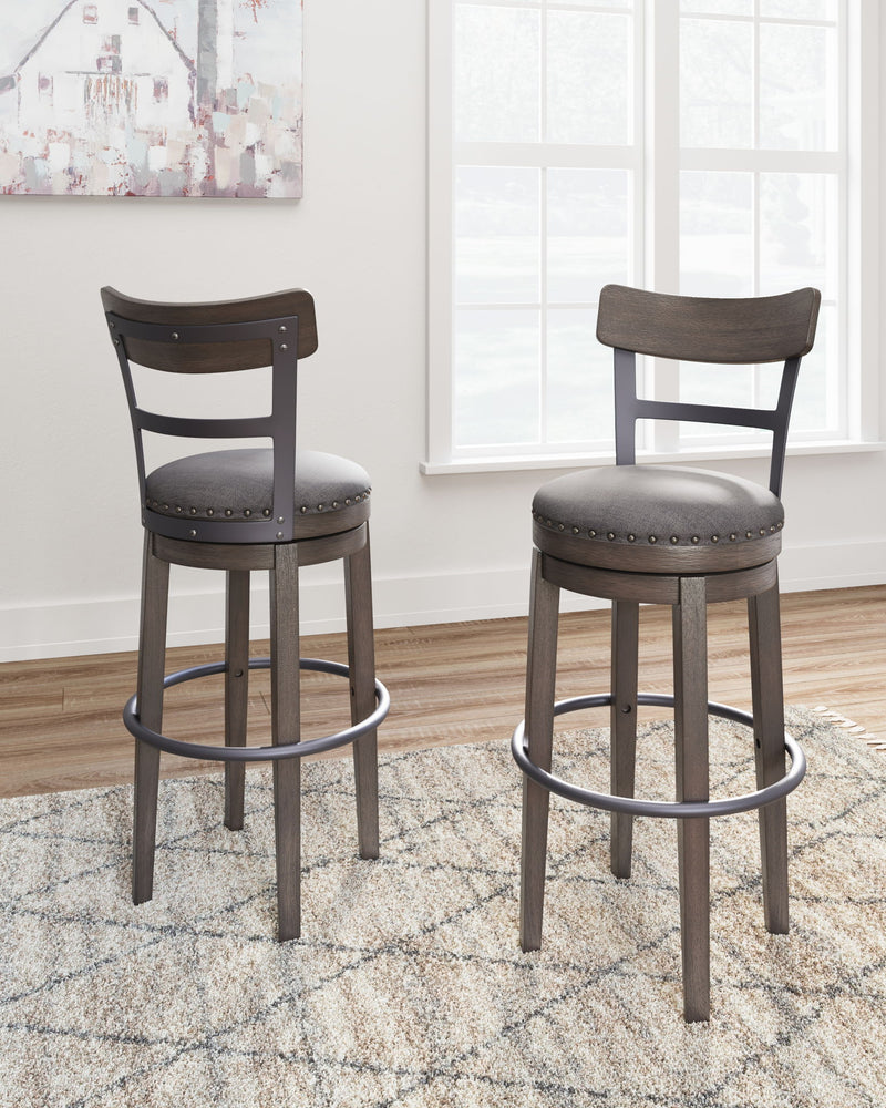 Caitbrook - Tall UPH Swivel Barstool - Gray - R&R Furniture Gallery (Fountain Valley, CA)