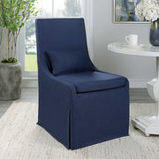 Uttermost Coley armless side chair with upholstered seat and wooden legs, modern design perfect for lounge or dining areas.