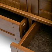Handcrafted Warm Shaker coffee table by Simpli-Home featuring a smooth wooden surface and sturdy legs.