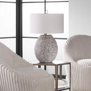 Uttermost Cyprien gray and white table lamp with a modern ceramic base and fabric shade, perfect for contemporary decor.