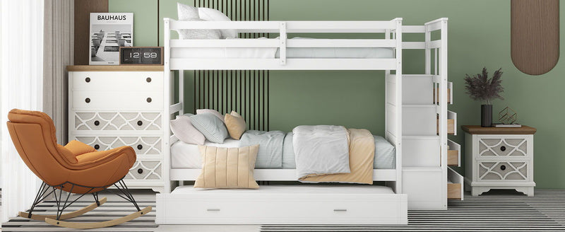White DreamHaus twin over twin bunk bed with staircase and trundle, featuring a sturdy design and space-saving features.