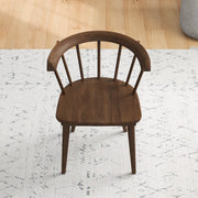 Set of two Ashcroft Furniture Kingsley brown dining chairs with wooden legs and upholstered seats.