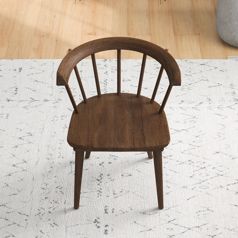 Set of two Ashcroft Furniture Kingsley brown dining chairs with wooden legs and upholstered seats.