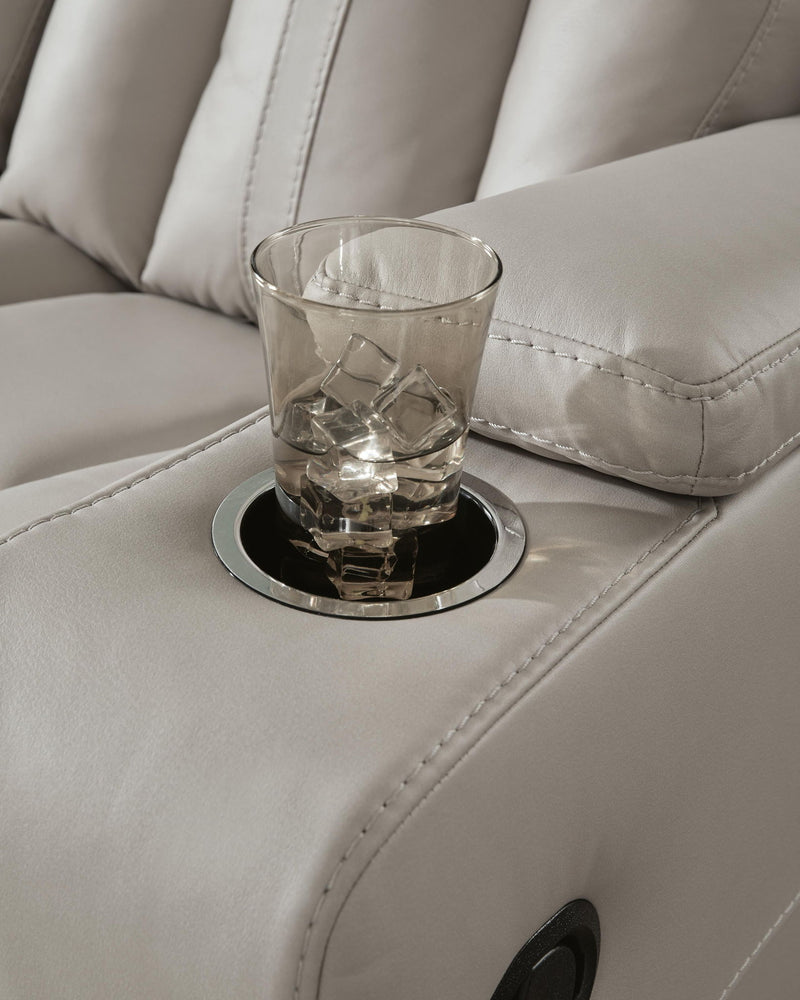 Signature Design by Ashley Elevate Edges Glider Recliner in Coin fabric, featuring plush cushioning and a smooth gliding mechanism.
