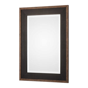 Uttermost Staveley Rustic Black Wall Mirror with a textured wooden frame, ideal for farmhouse or rustic decor.