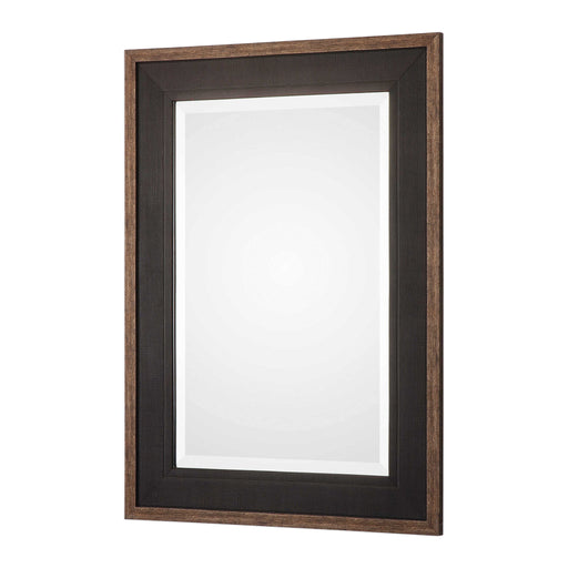 Uttermost Staveley Rustic Black Wall Mirror with a textured wooden frame, ideal for farmhouse or rustic decor.