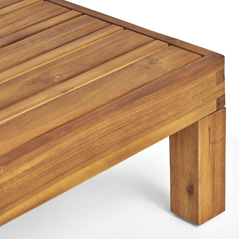 Noble House Mythical square outdoor coffee table with teak frame and slat top, stylish and durable for outdoor seating areas.