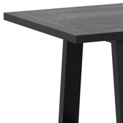 Simpli-Home Whitley dining table with a wooden finish, rectangular top, and sturdy legs, ideal for modern dining rooms.