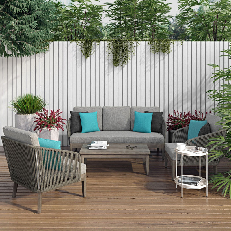 Simpli-Home Carmel outdoor conversation arm chair in Sand Drift color with cushioned seat and armrests, suitable for patio seating.