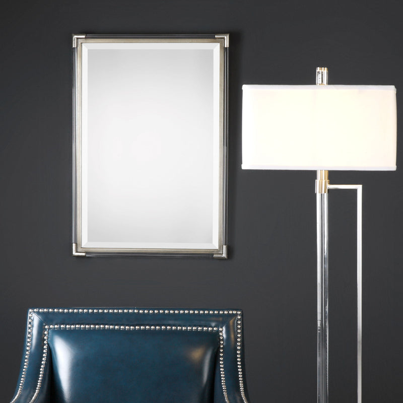 Silver metallic wall mirror by Uttermost, featuring a sleek, reflective surface and modern design perfect for contemporary decor.
