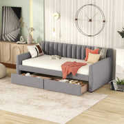 DreamHaus upholstered storage daybed with slat support, featuring a cozy fabric surface and built-in storage drawers underneath.