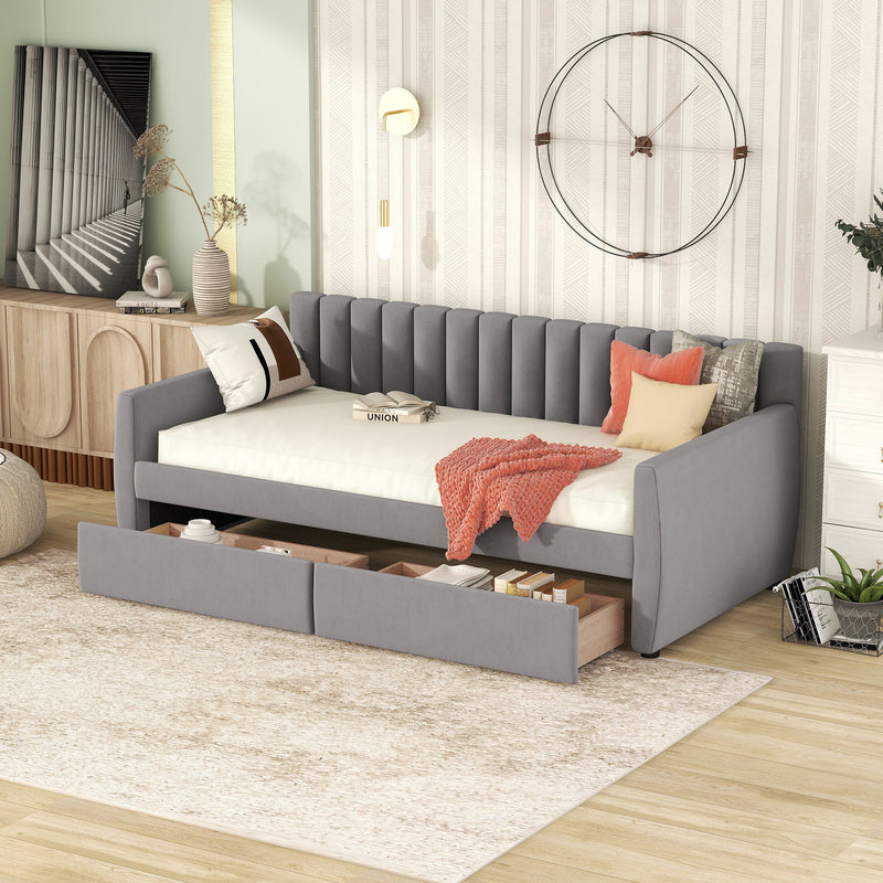 DreamHaus upholstered storage daybed with slat support, featuring a cozy fabric surface and built-in storage drawers underneath.