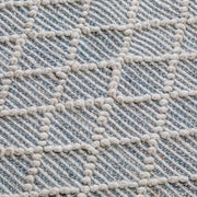 Simpli-Home Ogden 6' x 9' ivory area rug with a soft, textured surface and subtle pattern for living room decor.