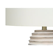Cream resin transitional table lamp with a sleek design, featuring a rounded base and fabric shade for modern home decor.