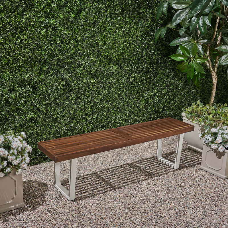 Noble House Intrinsic outdoor dining bench with slat top, sturdy wooden bench for patio or garden seating.