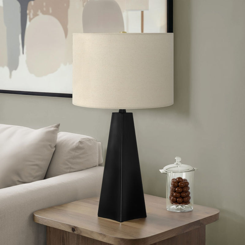 Modern black resin table lamp by 8th Street featuring a sleek design, perfect for contemporary home lighting.