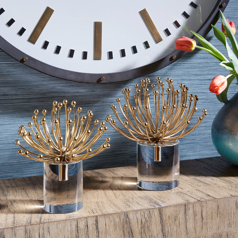 Gold modern sculptures set of 2 by Uttermost, decorative abstract figurines with sleek, contemporary design.