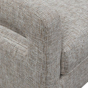 Uttermost O'Brien armchair with plush fabric upholstery and wooden legs, showcasing a stylish and comfortable design.