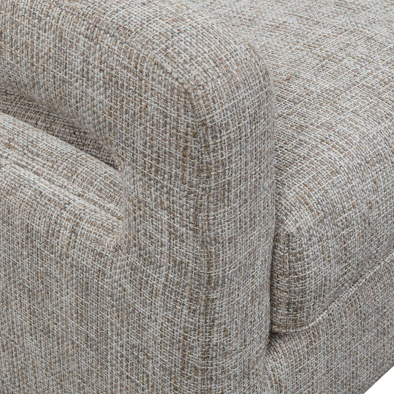 Uttermost O'Brien armchair with plush fabric upholstery and wooden legs, showcasing a stylish and comfortable design.