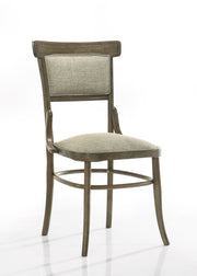 Set of two vintage walnut Bistro dining chairs with cushions from Lilola Home, showcasing classic wooden design and comfortable seating.