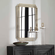 Uttermost Amherst wall mirror featuring a sleek, rectangular design with a modern frame, ideal for contemporary home decor.